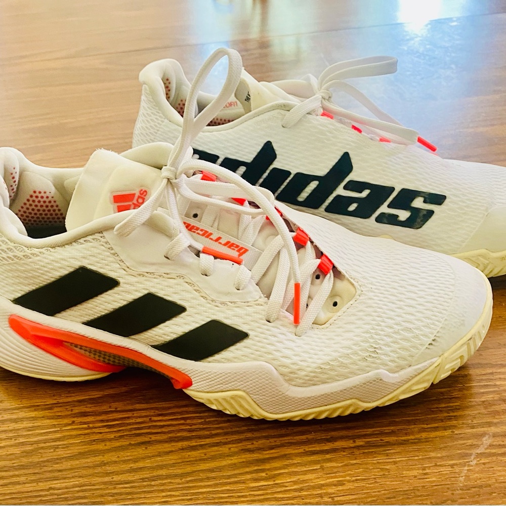 Adidas tennis shoes. Excellent condition. Worn once.